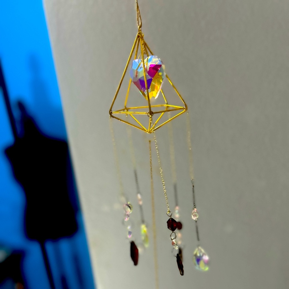 Large heart prism in gold pyramid frame suncatcher